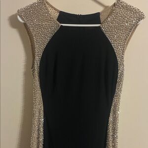 Elegant Black and Gold Sleeveless Dress